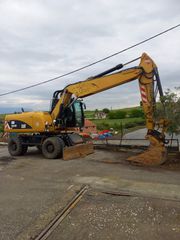 Εκσκαφέας Με Λάστιχα CAT 2012 M318D