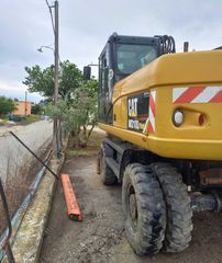 Εκσκαφέας Με Λάστιχα CAT 2012 M318D-thumb-4