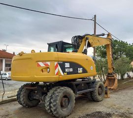 Εκσκαφέας Με Λάστιχα CAT 2012 M318D-thumb-5