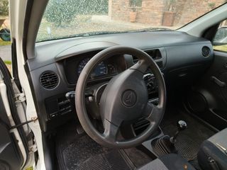 Daihatsu Cuore 2004 L251-thumb-12
