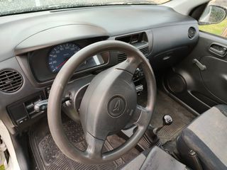 Daihatsu Cuore 2004 L251-thumb-16