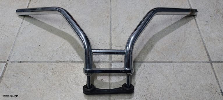 Γνήσιο τιμόνι Honda Steed/Shadow 400-600 με αντικραδασμικά λάστιχα σε άριστη κατάσταση.