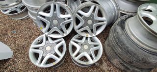SEAT INCA / VW POLO  ΖΑΝΤΕΣ ΑΛΟΥΜΙΝΙΟΥ MOMO 7Χ15 - 4×100 - ET38  ME ΜΠΟΥΛΟΝΙΑ