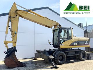 Wheeled Excavator CAT 2002 M322C ΓΙΑ ΕΙΣΑΓΩΓΗ 1