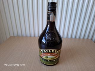 Μπουκάλι μαύρο ποτού  BAILEYS ORIGINAL IRISH CREAM DUBLIN Ιρλανδία, 700ml, σφραγισμένο με ταινία ασφαλείας από το Ελληνικό Υπουργείο και αναγραφή  του Εισαγωγέα ΜΕΤΑΞΑ ΑΒΕ. 1975-1980