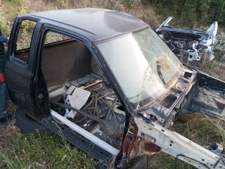 ΚΑΜΠΙΝΑ NISSAN NAYARA D22 ΘΟΛΟΙ,ΜΕΤΩΠΗ,ΚΟΛΩΝΕΣ,ΜΑΣΠΙΕ 1ΜΙΣΗ ΚΑΜΠΙΝΑ-thumb-1