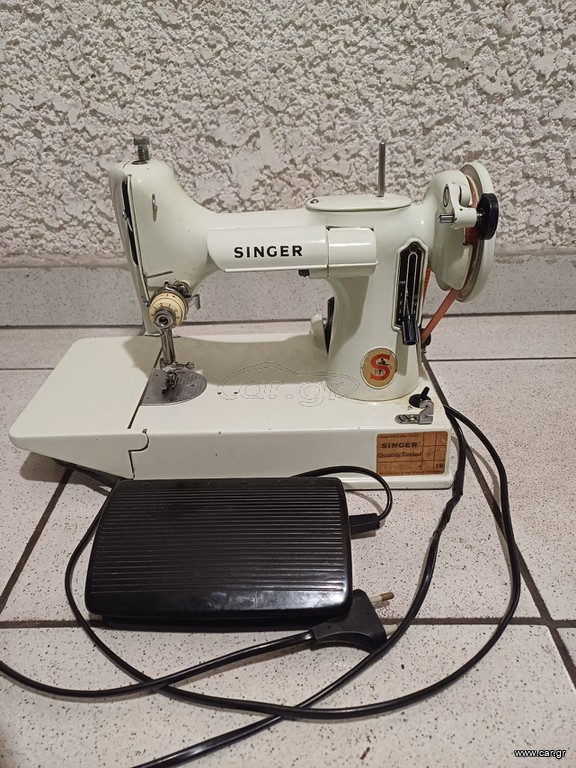 SINGER 1913 rev 1167 (221K)