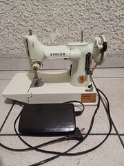 SINGER 1913 rev 1167 (221K)