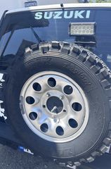 4 ζάντες 15άρες SUZUKI VITARA βαμμένες μαύρες  + 1 ρεζέρβα με απάτητο mud ελαστικό