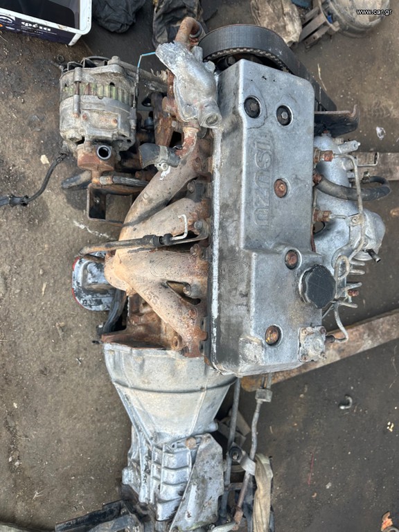 ISUZU kινητηρα απο κλουβα 4χ4 μαζι με σαζμαν διαφορικα κεντρικη ζαντεσ λαστικα ειδη φανοποιιασ κλπ