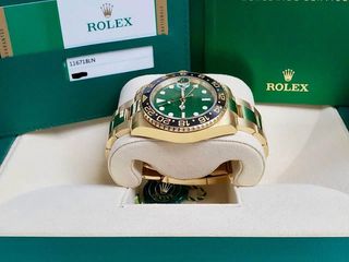 Rolex GMT-Master II, Yellow gold Green Dial, 116718LN 2012 Discontinued