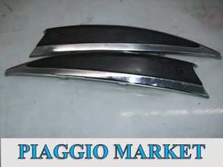 Καπακια πλευρων διακοσμητικα χρωμια για Piaggio Liberty 50-125-150. PIAGGIO MARKET. ΚΑΙΝΟΥΡΙΑ ΚΑΙ ΜΕΤΑΧΕΙΡΙΣΜΕΝ ΑΝΤΑΛΛΑΚΤΙΚΑ. Η τιμη ειναι ανα τεμαχιο.