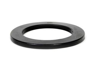 SPRING - PAD/TRIM PACKER BUSHING