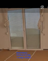 Διπλές Μπαλκονόπορτες, κουφώματα αλουμινίου με στορια.