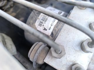 Μονάδα Abs από ford escort 1998 και κομπρεσέρ aircodition  και πόρτακι ρεζερβουάρ