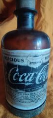 μπουκαλι Η coca cola ΜΕ ΜΡΠΡΟΥΤΝΙΝΗ ΒΑΣΗ ΚΑΙ ΣΦΡΑΓΙΔΑ 1896 αρχικα χρησιμοποιήθηκε σαν φαρμακο και αργοτερα σαν αναψυκτικο Συλλεκτικόλη Κόκα κόλα σπάνιο μπουκάλι εποχής 1896