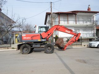 Εκσκαφέας Με Λάστιχα O & K 2000 MH PLUS B