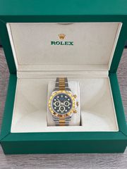 Rolex Daytona gold black