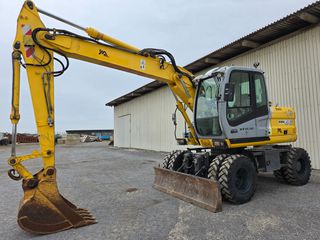 Wheeled Excavator New Holland 2005 MH 4.6.  6200 ώρες!!!