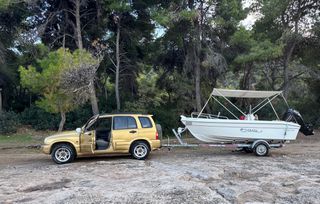 Suzuki Grand Vitara 2000 Suzkui + Tempest 45 Boat with Trailer