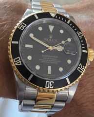 Rolex submariner steel and gold V series 2009