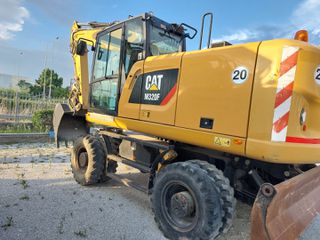 Εκσκαφέας Με Λάστιχα CAT 2017 M 322 F