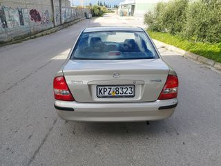 Mazda 323 2000 1300cc-thumb-4