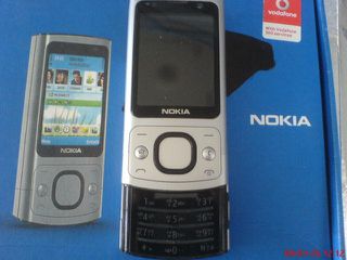 NOKIA  6700 slide κομπλε με το κουτι, μπαταρια Γνησια αδουλευτη, φορτιστη ,ακουστικα, καλωδιο δεδομενων, βιβλιο..