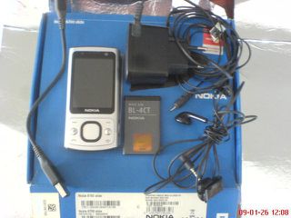 NOKIA 6700 slide κομπλε με το κουτι, μπαταρια Γνησια αδουλευτη, φορτιστη ,ακουστικα, καλωδιο δεδομενων, βιβλιο..