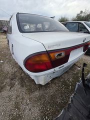 Ανταλλακτικά Mazda 323 Sedan (BA) - Λευκό / Μηχανή 16V & Σαλόνι / ΠΑΠΑΝΙΚΟΣ