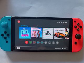 Nintendo Switch OLED σε άριστη κατάσταση + 4 παιχνίδια + extras