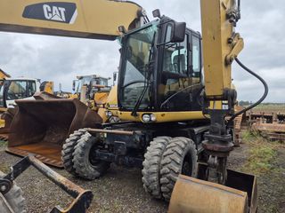 Εκσκαφέας Με Λάστιχα CAT 2010 M318 D-thumb-1