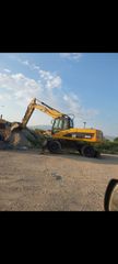 Εκσκαφέας Με Λάστιχα CAT 2008 Μ 322D