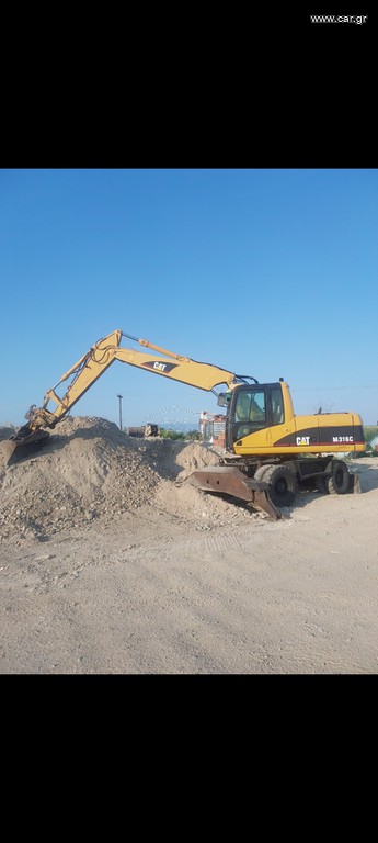 Εκσκαφέας Με Λάστιχα CAT 2004 M 316C