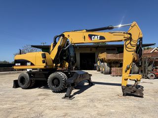 Εκσκαφέας Με Λάστιχα CAT 2004 M318C