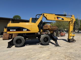Εκσκαφέας Με Λάστιχα CAT 2004 M318C-thumb-1