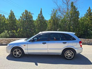 Mazda 323 1999-thumb-1