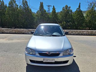 Mazda 323 1999-thumb-2
