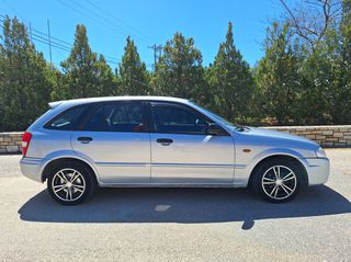 Mazda 323 1999-thumb-3