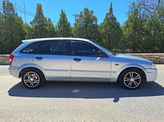 Mazda 323 1999-thumb-4