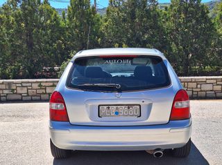 Mazda 323 1999-thumb-5