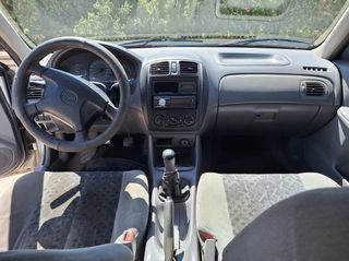 Mazda 323 1999-thumb-10