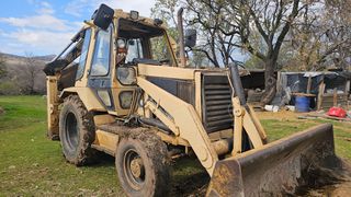 Εκσκαφέας Με Λάστιχα CAT 1991 4×4  CATERPILLAR