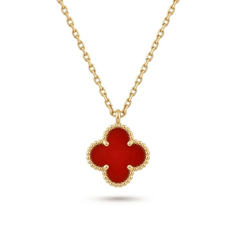 Κόκκινο clover χρυσό