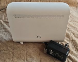 ZTE ZXHN H268N router modem με το τροφοδοτικό του