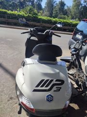 Piaggio MP3 2009 ME ΠΟΔΟΦΡΕΝΟ - ΟΔΗΓΕΙΤΑΙ ΜΕ ΔΙΠΛΩΜΑ ΑΥΤΟΚΙΝΗΤΟΥ!!-thumb-1