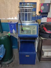 Fuel injector cleaning and testing system