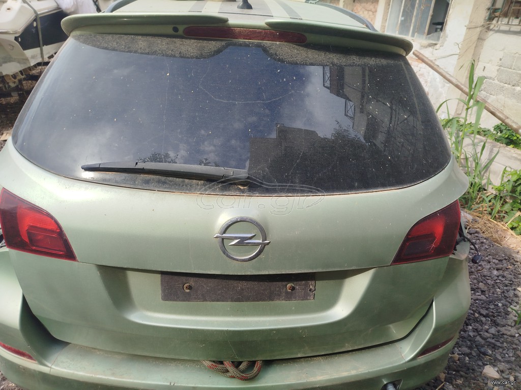 Πορτμπαγκάζ πόρτα astra j 2011 με φανάρια εσωτερικα τζάμι κλειδαριά