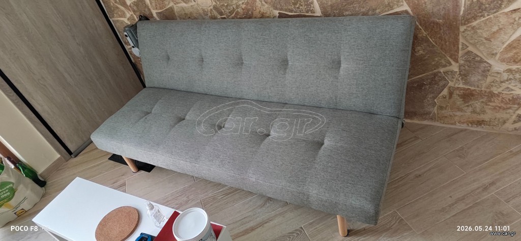 Sofabed, office chair and coffee table