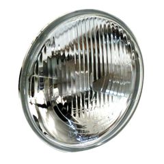 MCS Headlamp unit H4. Ribbed lens. 7″